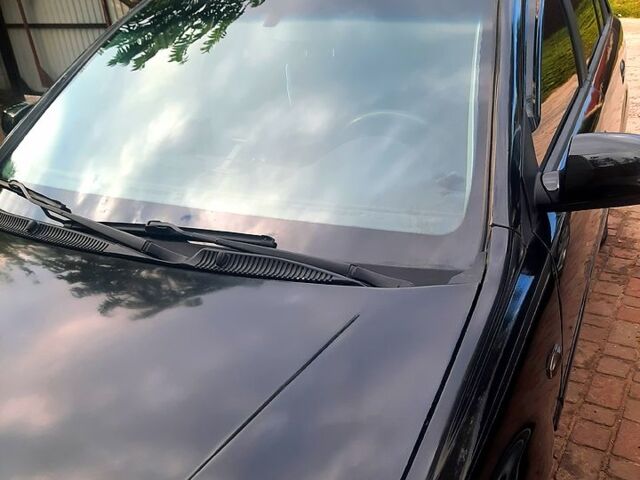 Черный Киа Рио, объемом двигателя 1.4 л и пробегом 392 тыс. км за 3700 $, фото 1 на Automoto.ua