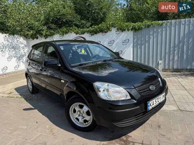 Чорний Кіа Ріо, об'ємом двигуна 1.4 л та пробігом 180 тис. км за 5999 $, фото 1 на Automoto.ua