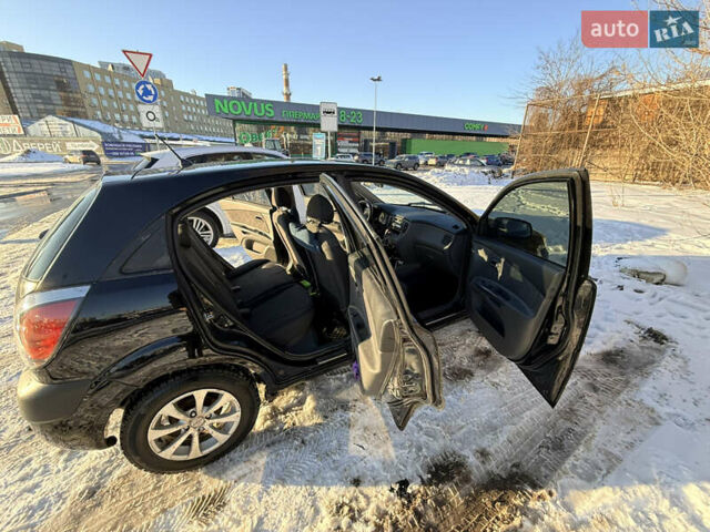 Чорний Кіа Ріо, об'ємом двигуна 1.4 л та пробігом 208 тис. км за 6200 $, фото 13 на Automoto.ua