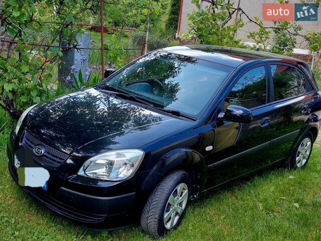 Чорний Кіа Ріо, об'ємом двигуна 1.4 л та пробігом 290 тис. км за 4600 $, фото 6 на Automoto.ua