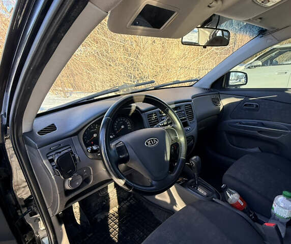 Чорний Кіа Ріо, об'ємом двигуна 1.4 л та пробігом 208 тис. км за 6200 $, фото 16 на Automoto.ua