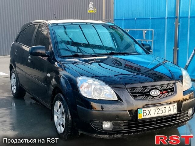 Черный Киа Рио, объемом двигателя 1.4 л и пробегом 349 тыс. км за 2599 $, фото 2 на Automoto.ua