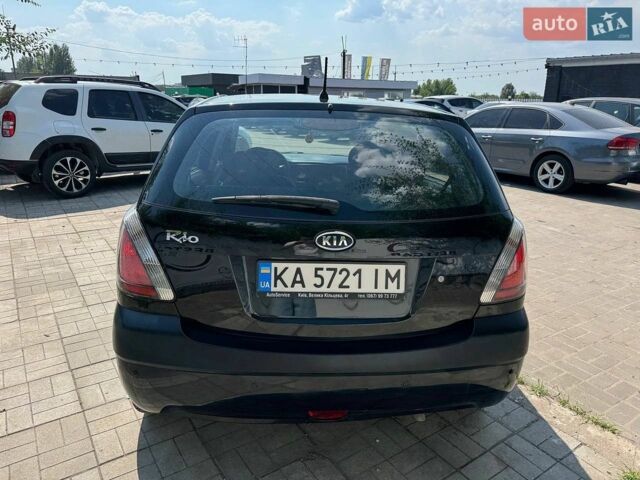 Чорний Кіа Ріо, об'ємом двигуна 1.4 л та пробігом 180 тис. км за 5999 $, фото 5 на Automoto.ua