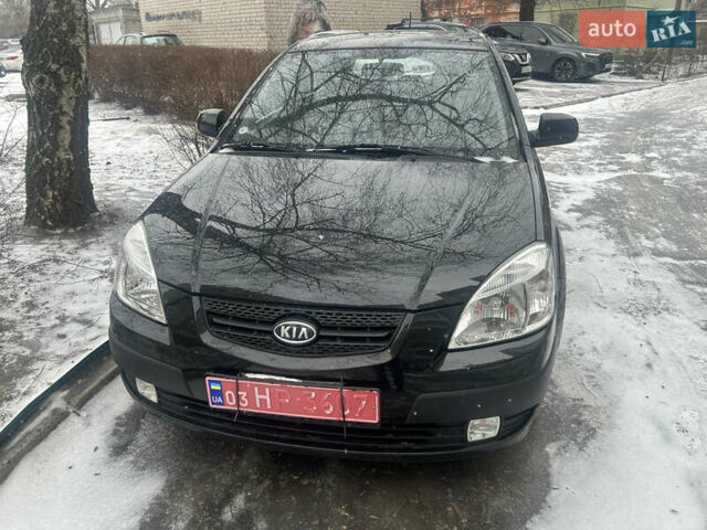 Чорний Кіа Ріо, об'ємом двигуна 1.4 л та пробігом 166 тис. км за 5450 $, фото 3 на Automoto.ua