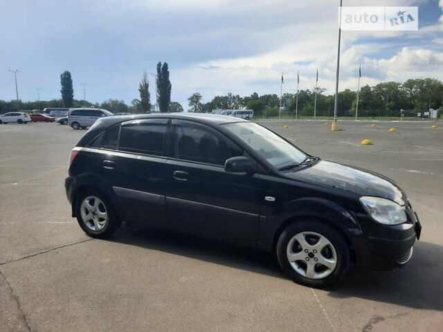 Черный Киа Рио, объемом двигателя 1.4 л и пробегом 222 тыс. км за 4100 $, фото 2 на Automoto.ua