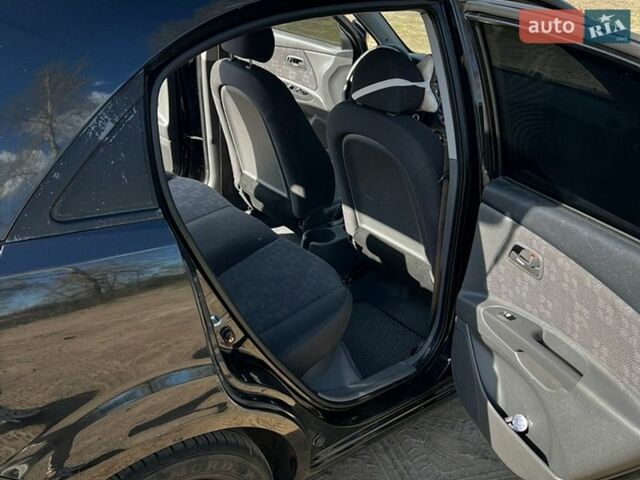 Черный Киа Рио, объемом двигателя 1.4 л и пробегом 103 тыс. км за 3400 $, фото 18 на Automoto.ua