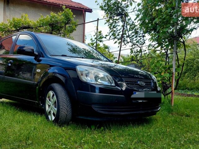 Чорний Кіа Ріо, об'ємом двигуна 1.4 л та пробігом 290 тис. км за 4600 $, фото 8 на Automoto.ua