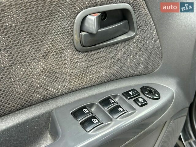 Чорний Кіа Ріо, об'ємом двигуна 1.4 л та пробігом 260 тис. км за 4800 $, фото 11 на Automoto.ua