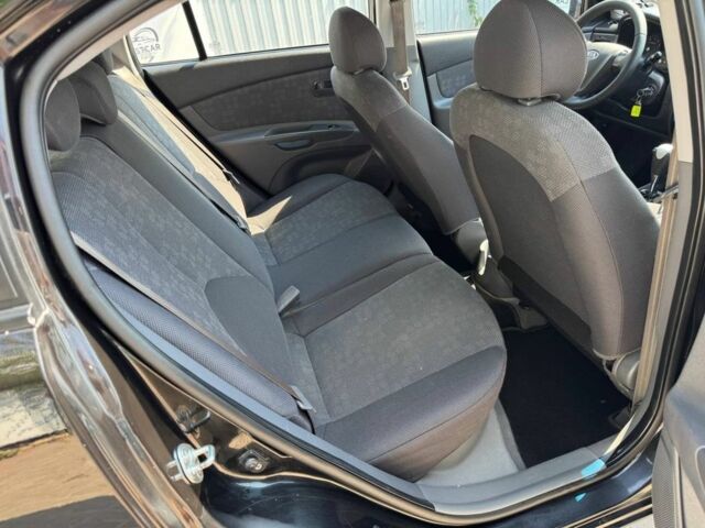 Черный Киа Рио, объемом двигателя 1.4 л и пробегом 160 тыс. км за 5993 $, фото 13 на Automoto.ua