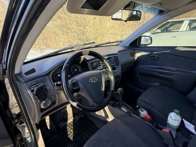 Чорний Кіа Ріо, об'ємом двигуна 1.4 л та пробігом 208 тис. км за 6200 $, фото 7 на Automoto.ua