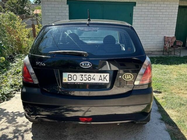 Черный Киа Рио, объемом двигателя 1.4 л и пробегом 214 тыс. км за 5100 $, фото 3 на Automoto.ua