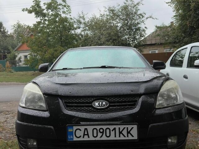 Чорний Кіа Ріо, об'ємом двигуна 1.4 л та пробігом 140 тис. км за 6500 $, фото 6 на Automoto.ua