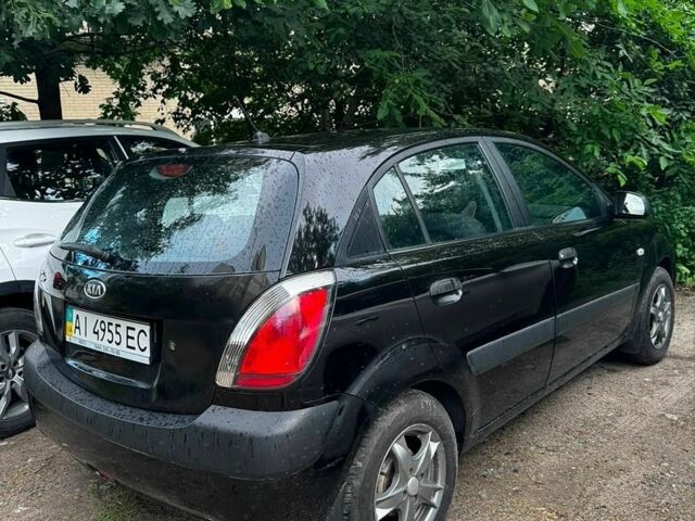 Черный Киа Рио, объемом двигателя 1.4 л и пробегом 270 тыс. км за 5100 $, фото 4 на Automoto.ua