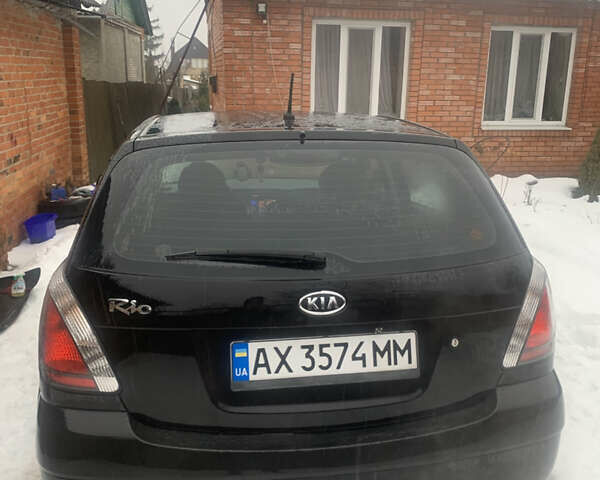Черный Киа Рио, объемом двигателя 1.4 л и пробегом 86 тыс. км за 5300 $, фото 1 на Automoto.ua