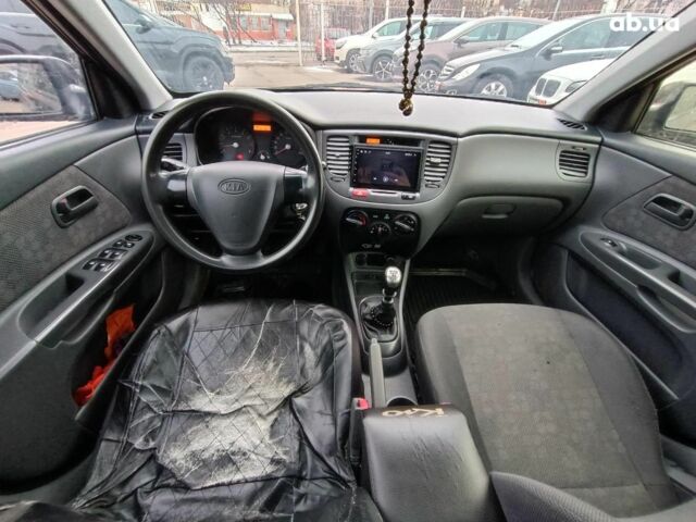 Черный Киа Рио, объемом двигателя 1.4 л и пробегом 274 тыс. км за 5290 $, фото 20 на Automoto.ua
