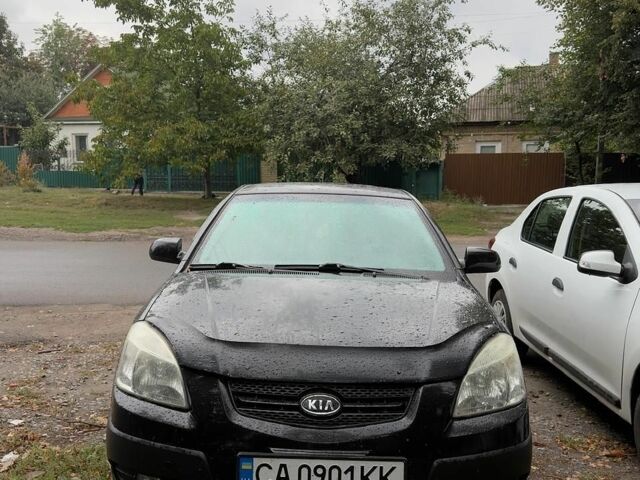 Чорний Кіа Ріо, об'ємом двигуна 1.4 л та пробігом 140 тис. км за 6500 $, фото 7 на Automoto.ua