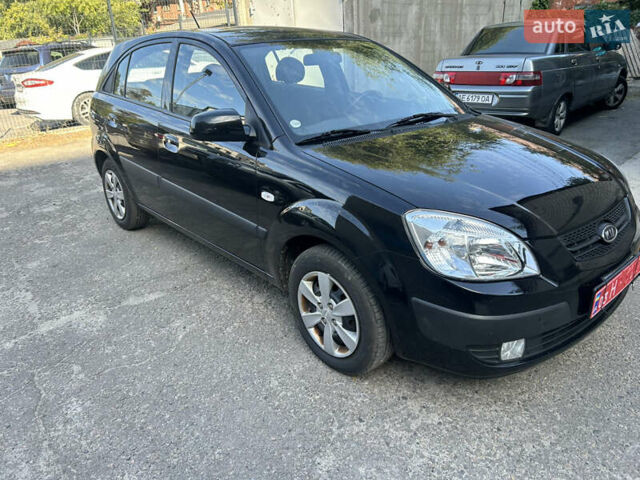 Чорний Кіа Ріо, об'ємом двигуна 1.4 л та пробігом 166 тис. км за 6100 $, фото 1 на Automoto.ua