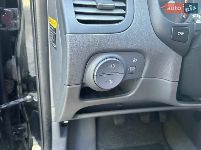 Чорний Кіа Ріо, об'ємом двигуна 1.4 л та пробігом 166 тис. км за 6100 $, фото 8 на Automoto.ua