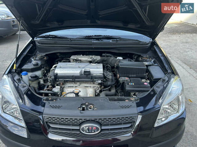 Чорний Кіа Ріо, об'ємом двигуна 1.4 л та пробігом 166 тис. км за 6100 $, фото 10 на Automoto.ua