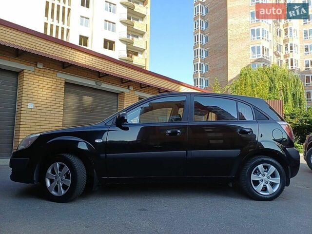 Черный Киа Рио, объемом двигателя 1.4 л и пробегом 212 тыс. км за 4400 $, фото 5 на Automoto.ua