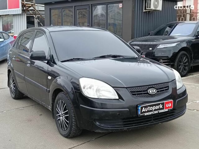 Черный Киа Рио, объемом двигателя 1.4 л и пробегом 274 тыс. км за 5290 $, фото 2 на Automoto.ua