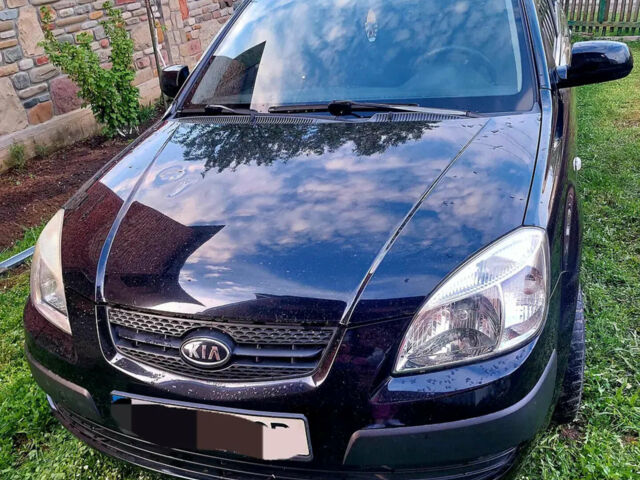 Чорний Кіа Ріо, об'ємом двигуна 1.4 л та пробігом 290 тис. км за 4600 $, фото 1 на Automoto.ua