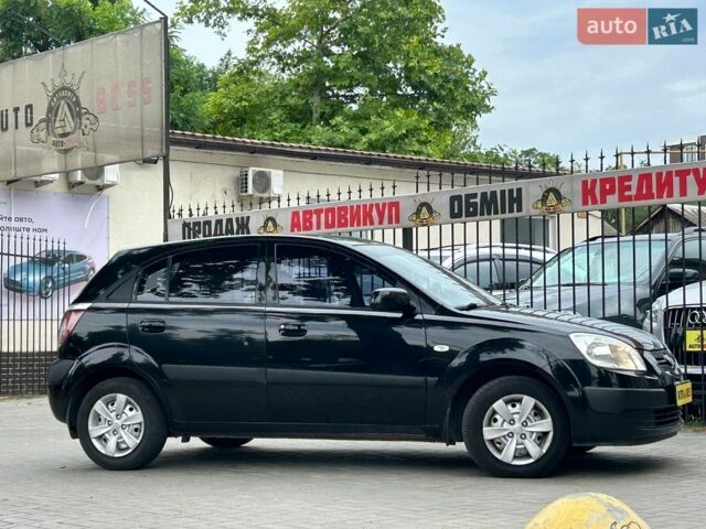 Чорний Кіа Ріо, об'ємом двигуна 1.4 л та пробігом 260 тис. км за 4800 $, фото 1 на Automoto.ua