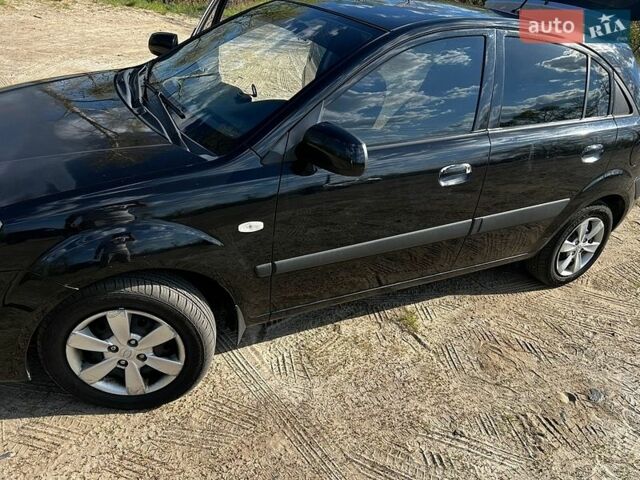 Черный Киа Рио, объемом двигателя 1.4 л и пробегом 103 тыс. км за 3400 $, фото 10 на Automoto.ua