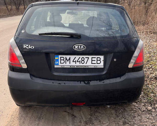 Черный Киа Рио, объемом двигателя 1.4 л и пробегом 194 тыс. км за 4900 $, фото 2 на Automoto.ua