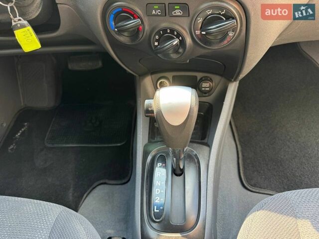 Чорний Кіа Ріо, об'ємом двигуна 1.4 л та пробігом 180 тис. км за 5999 $, фото 9 на Automoto.ua