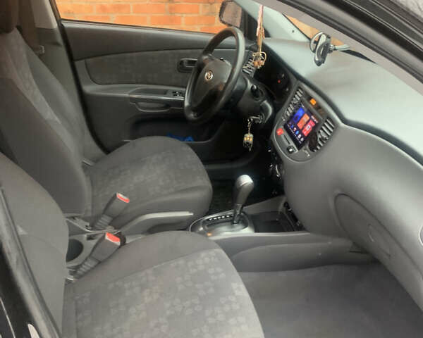 Черный Киа Рио, объемом двигателя 1.4 л и пробегом 86 тыс. км за 5300 $, фото 10 на Automoto.ua