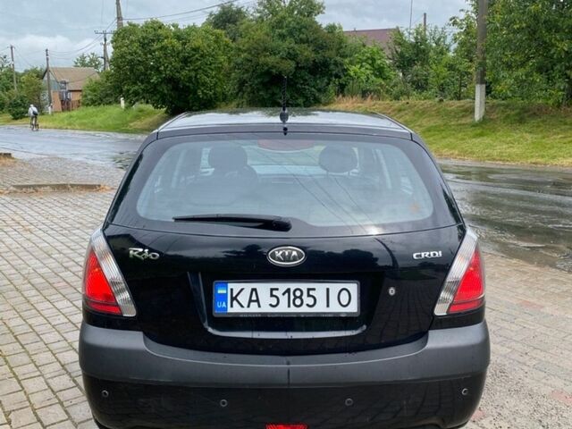 Чорний Кіа Ріо, об'ємом двигуна 1.49 л та пробігом 241 тис. км за 4150 $, фото 7 на Automoto.ua