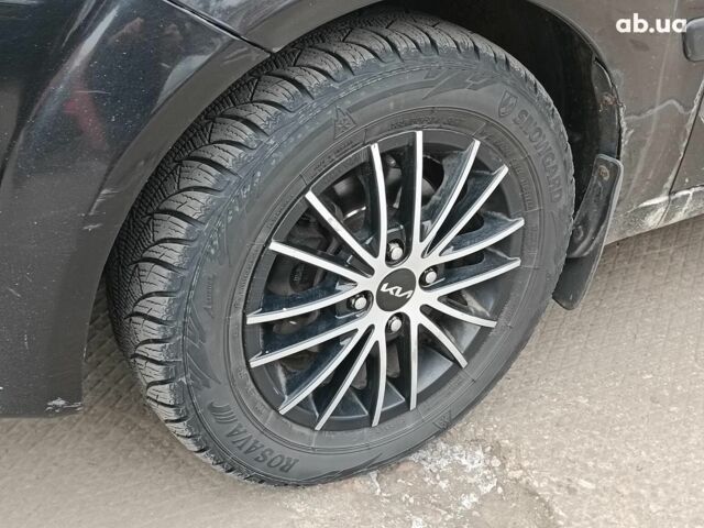 Черный Киа Рио, объемом двигателя 1.4 л и пробегом 274 тыс. км за 5290 $, фото 3 на Automoto.ua