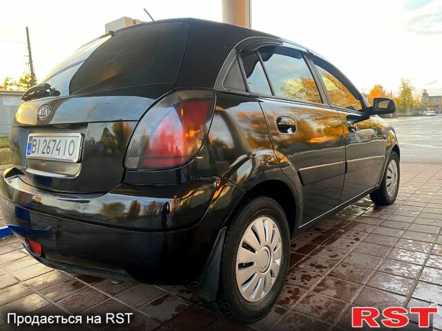 Чорний Кіа Ріо, об'ємом двигуна 1.4 л та пробігом 160 тис. км за 3900 $, фото 2 на Automoto.ua