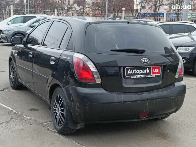 Черный Киа Рио, объемом двигателя 1.4 л и пробегом 274 тыс. км за 5290 $, фото 4 на Automoto.ua