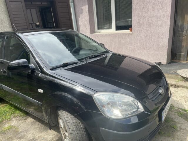 Черный Киа Рио, объемом двигателя 1.4 л и пробегом 260 тыс. км за 3600 $, фото 1 на Automoto.ua