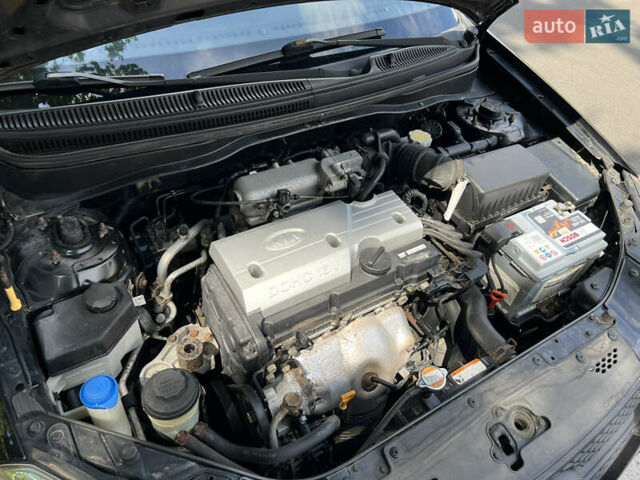 Черный Киа Рио, объемом двигателя 1.4 л и пробегом 193 тыс. км за 5800 $, фото 6 на Automoto.ua