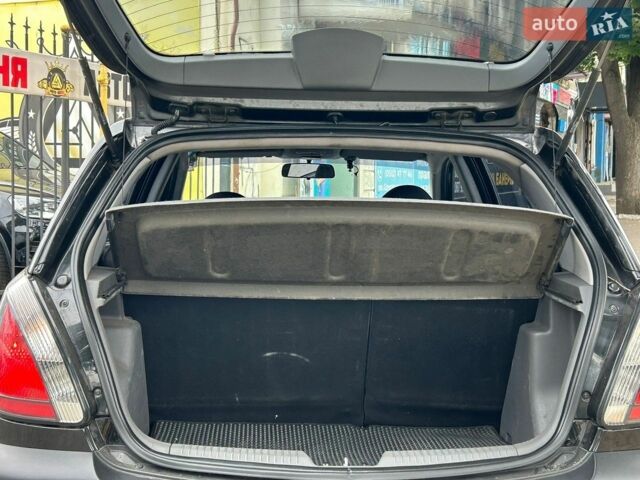 Чорний Кіа Ріо, об'ємом двигуна 1.4 л та пробігом 260 тис. км за 4800 $, фото 17 на Automoto.ua