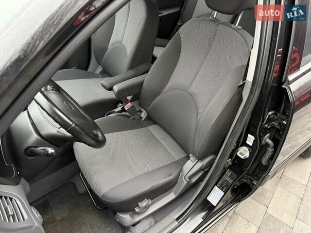Черный Киа Рио, объемом двигателя 1.4 л и пробегом 166 тыс. км за 6000 $, фото 12 на Automoto.ua