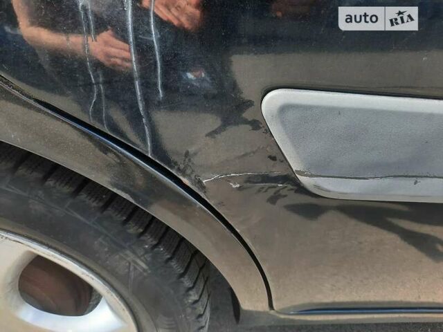 Черный Киа Рио, объемом двигателя 1.4 л и пробегом 222 тыс. км за 4100 $, фото 6 на Automoto.ua