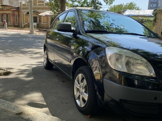 Чорний Кіа Ріо, об'ємом двигуна 1.4 л та пробігом 260 тис. км за 3100 $, фото 6 на Automoto.ua