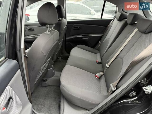 Черный Киа Рио, объемом двигателя 1.4 л и пробегом 166 тыс. км за 6000 $, фото 13 на Automoto.ua