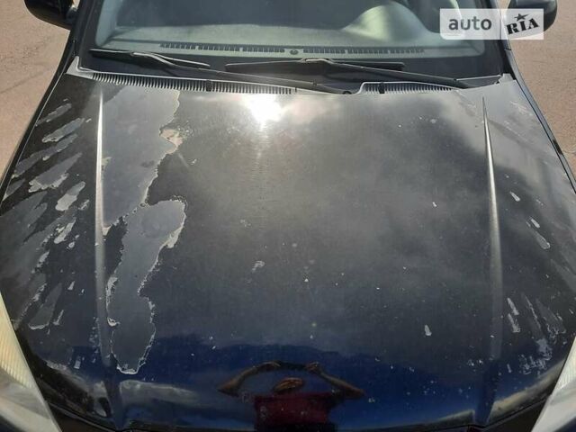 Черный Киа Рио, объемом двигателя 1.4 л и пробегом 222 тыс. км за 4100 $, фото 4 на Automoto.ua