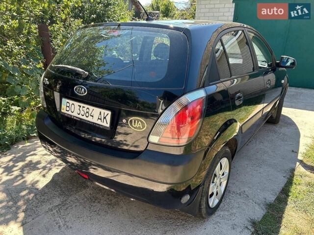 Черный Киа Рио, объемом двигателя 1.4 л и пробегом 214 тыс. км за 5100 $, фото 2 на Automoto.ua