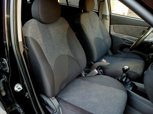 Черный Киа Рио, объемом двигателя 1.4 л и пробегом 212 тыс. км за 4430 $, фото 6 на Automoto.ua