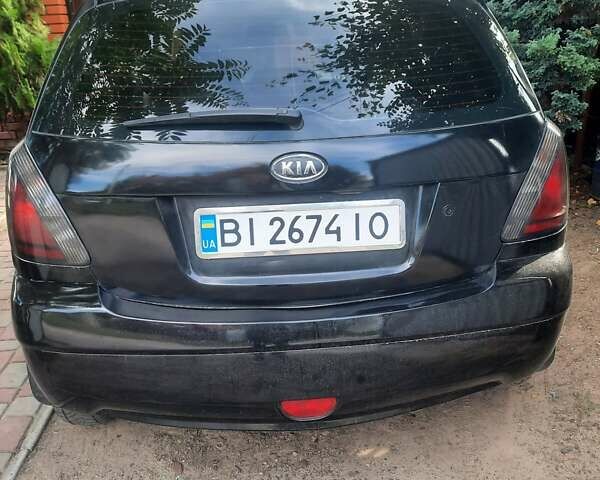 Черный Киа Рио, объемом двигателя 1.4 л и пробегом 390 тыс. км за 3500 $, фото 2 на Automoto.ua