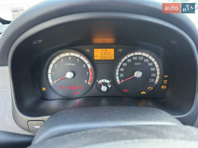 Чорний Кіа Ріо, об'ємом двигуна 1.4 л та пробігом 166 тис. км за 6100 $, фото 4 на Automoto.ua