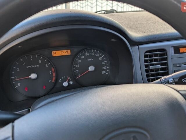 Чорний Кіа Ріо, об'ємом двигуна 1.4 л та пробігом 287 тис. км за 4400 $, фото 11 на Automoto.ua