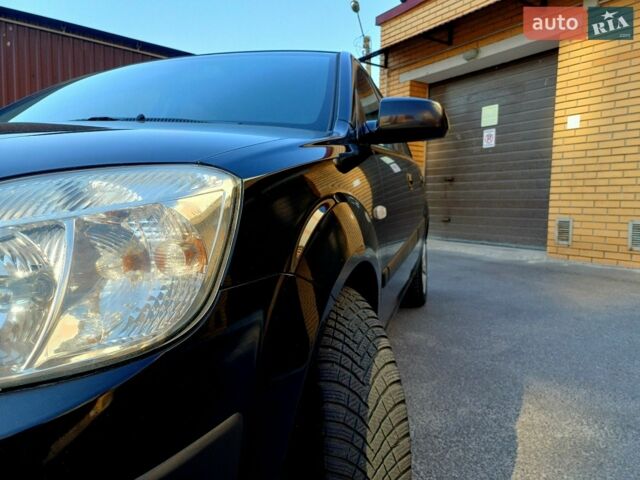 Черный Киа Рио, объемом двигателя 1.4 л и пробегом 212 тыс. км за 4400 $, фото 4 на Automoto.ua