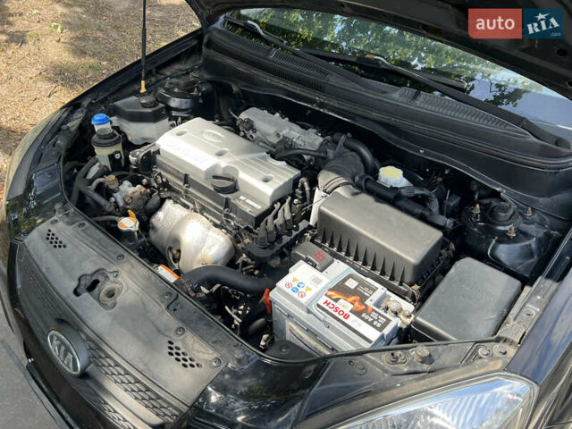 Черный Киа Рио, объемом двигателя 1.4 л и пробегом 193 тыс. км за 5800 $, фото 7 на Automoto.ua
